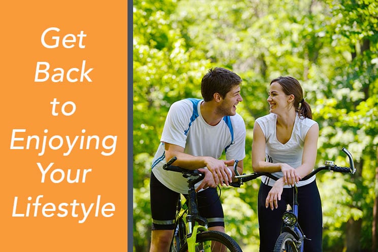 happy couple biking after neck surgery