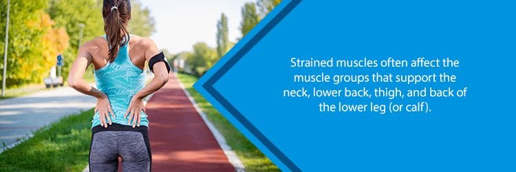 female runner with muscle strain in lower back