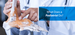 podiatrist pointing to foot skeleton