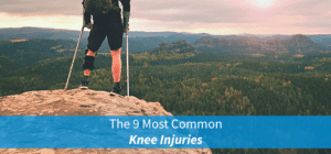 man with knee injury standing on mountain with crutches