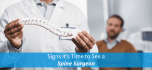 spine surgeon with patient