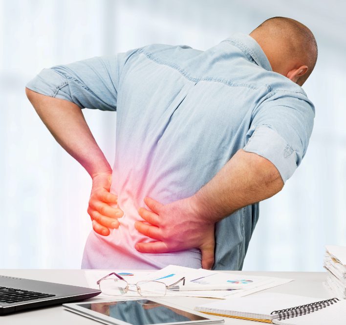 Older man experiencing lower back pain