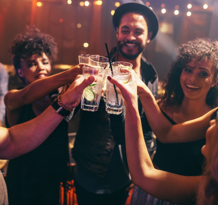 friends drinking and cheering