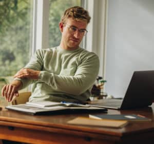 older man working from home