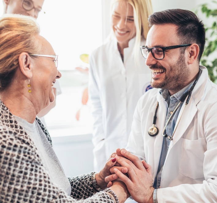 young doctor during home visit senior people