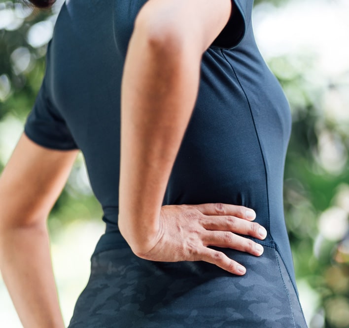 Young women with back pain