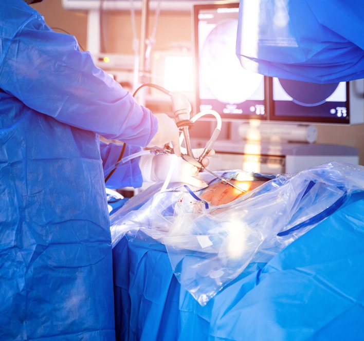 Surgeons perform spine surgery
