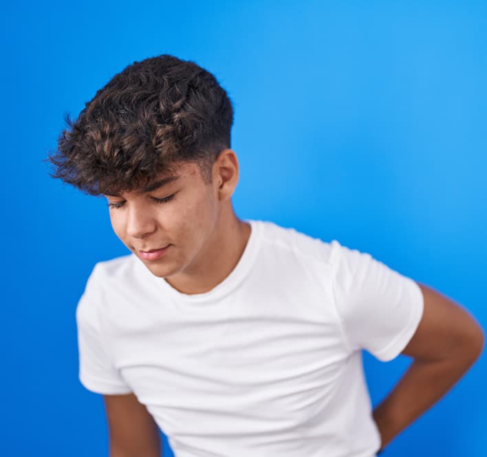 teenager suffering from backache
