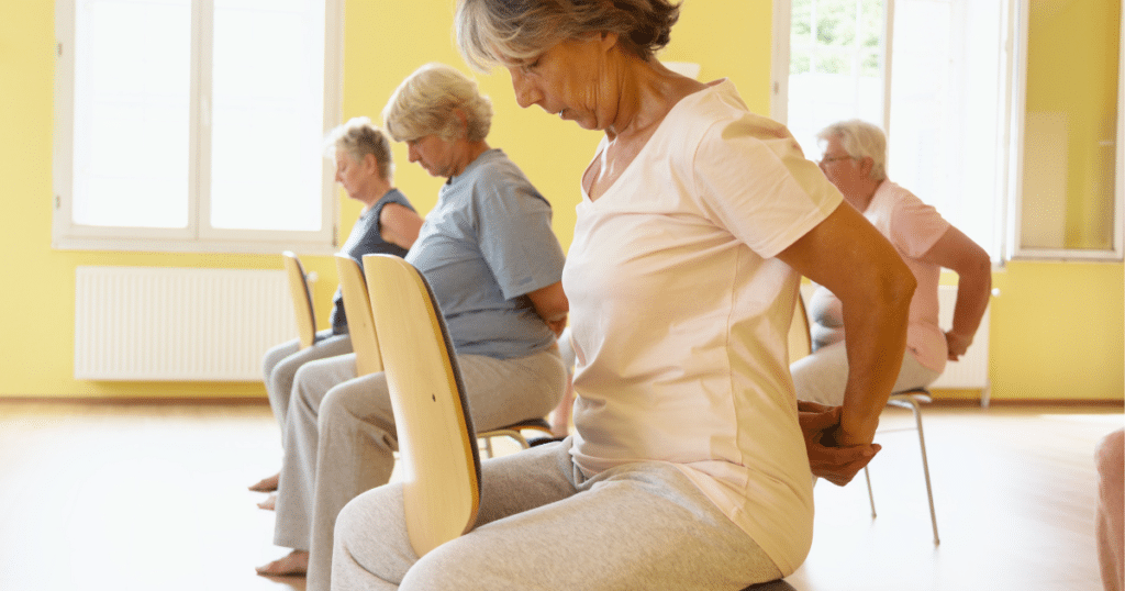 Patient experiencing lower back pain caused by muscular strain or structural spine condition.